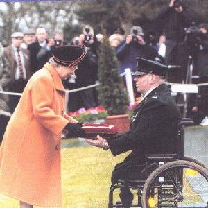 The Queen awards the George Cross to a RUC representative